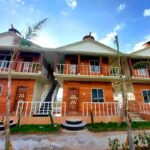 Eagle Cottage exterior with signature eagle statues, Dakshina Hawa Resort